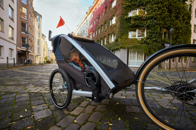 Stadttrip auf dem Fahrrad mit Kind im Croozer Kid Lykke