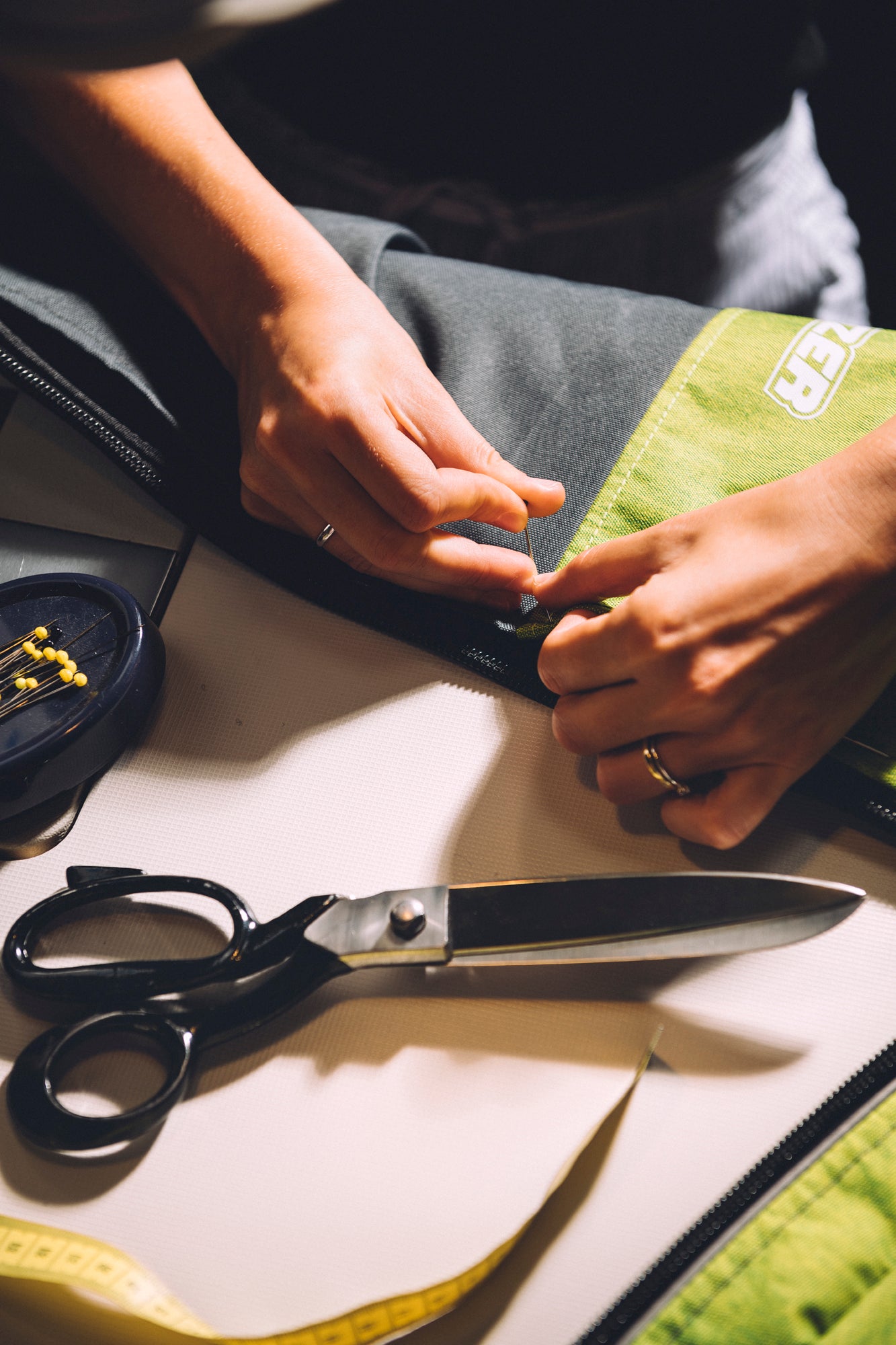 Behind the scenes of Croozer bike trailer manufacturing - team member working on texture