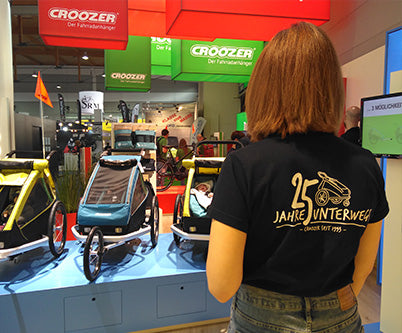 Croozer bike trailer exhibition booth at trade show - displaying kid bicycle trailers