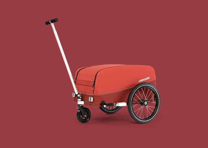 Croozer Cargo Pakko in Lava Red with attached handcart kit