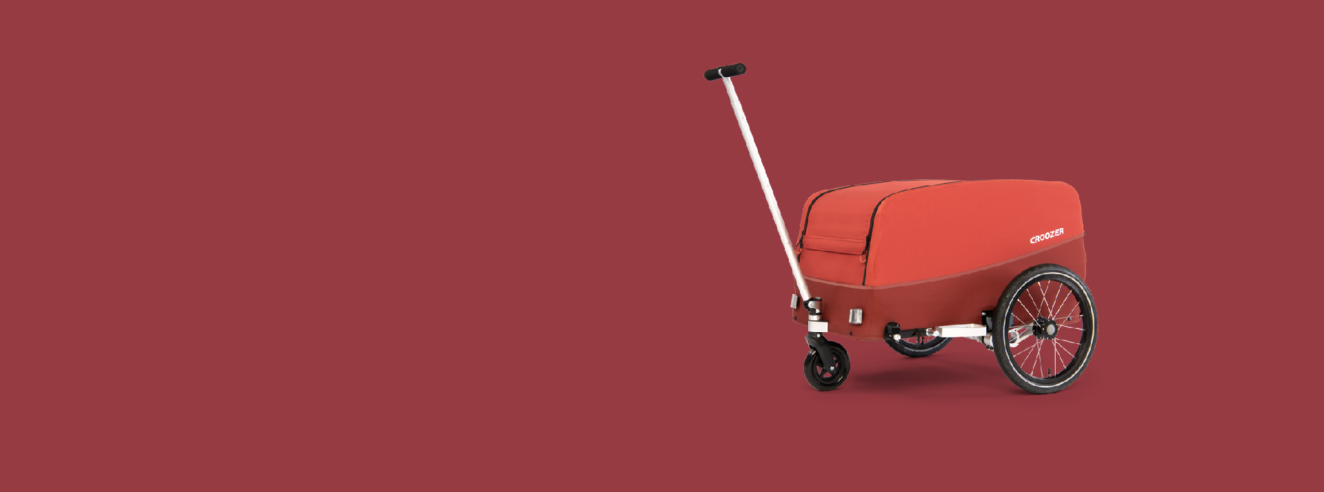 Croozer Cargo Tuure in Lava Red with attached handcart kit for even more practical use