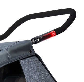 Croozer Kid Vaaya bike trailer push handle with red and white sensor light