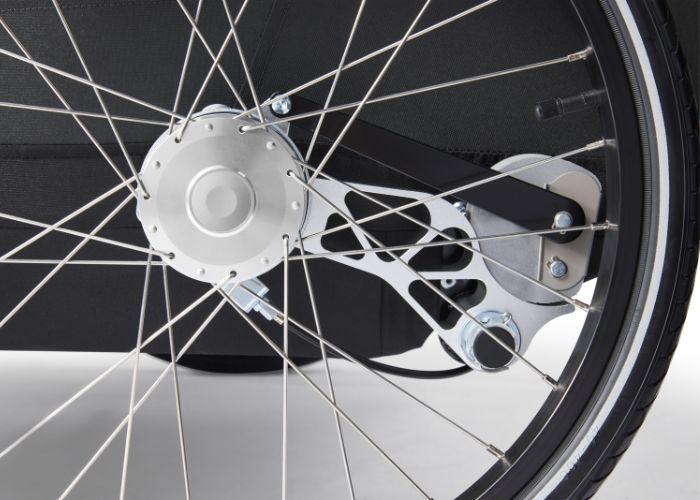 Close-up of Croozer Yuuna trailer wheel showing AirPad suspension system