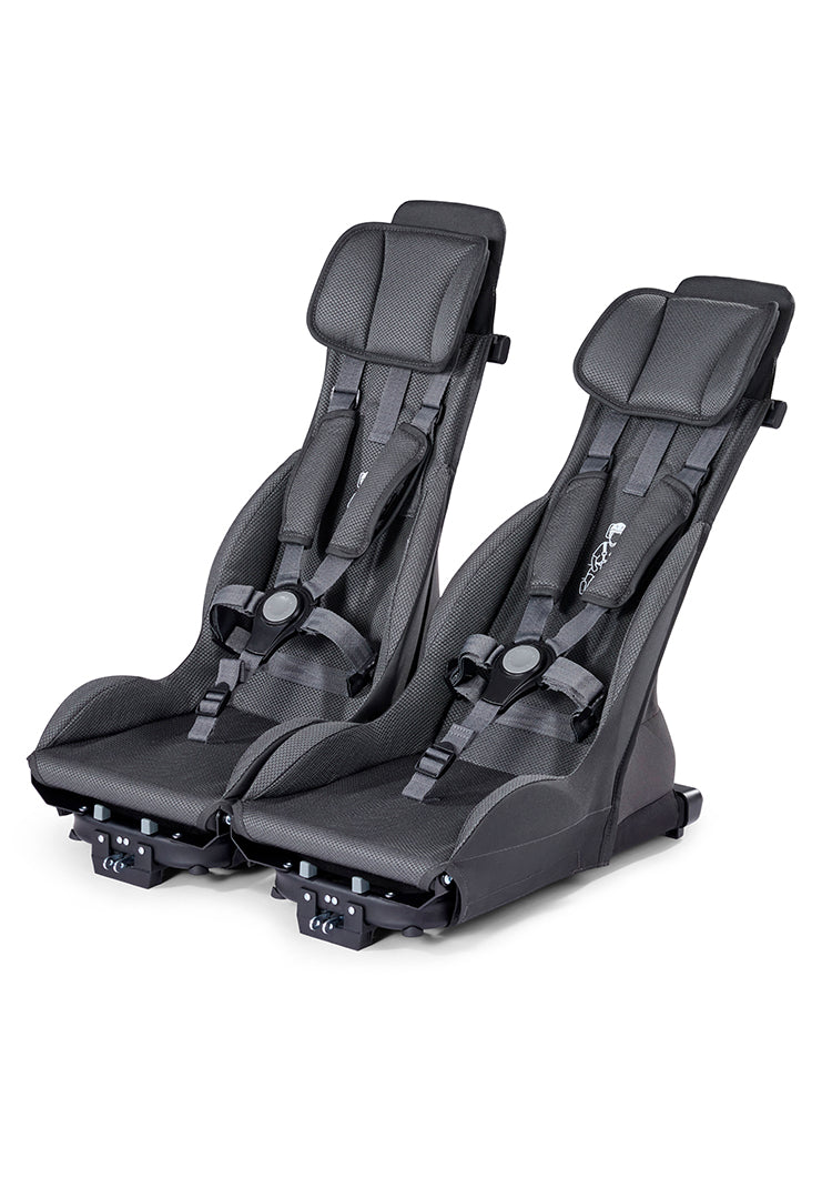 Two Croozer Yuuna adjustable premium seats with 5-point safety harnesses and headrests