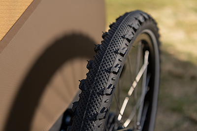 Croozer bike trailer tire black with deep tread knobs for traction and durability
